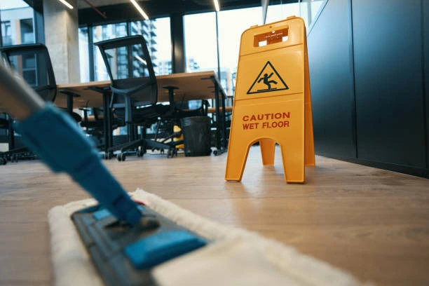 Professional cleaning setup with yellow caution sign and mop for janitorial services in Lodi, CA